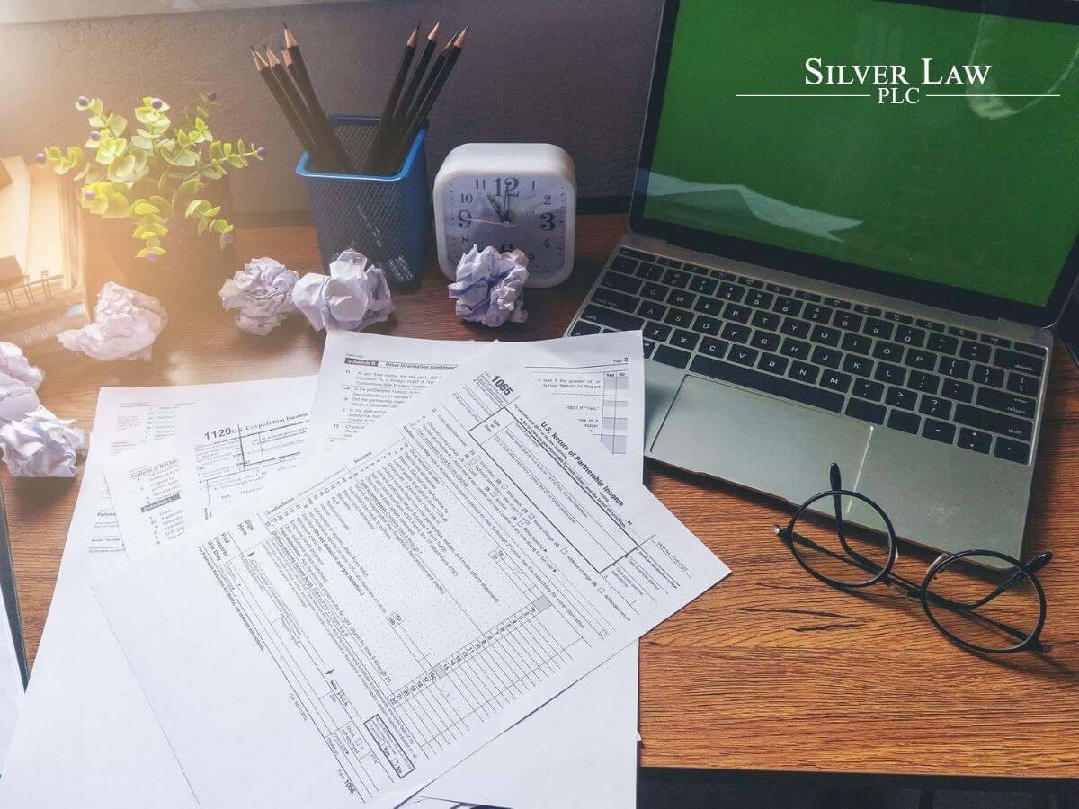 Desk with forms and papers prepared for a tax audit