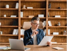 Tax Lawyer Checking Documents