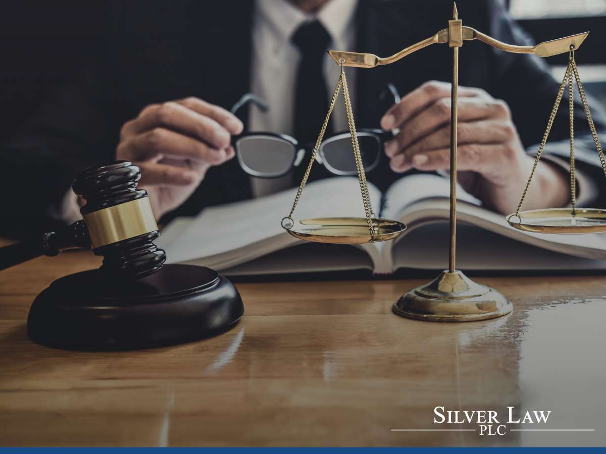 Gavel and scales on a desk, signifying the Corporate Transparency Act